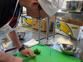  Culinary Arts Academy student preparing food